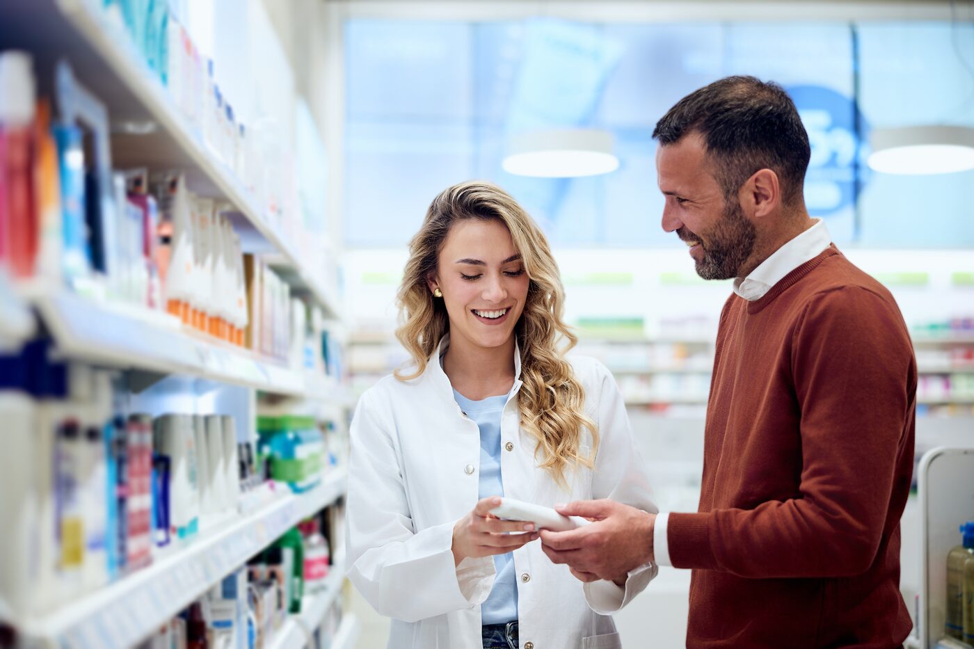 A pharmacist helping a customer